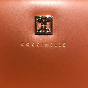 Coccinelle Brown zip around wallet